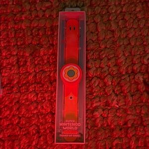 Super Nintendo World Power Up Band - princess daisy - universal studio